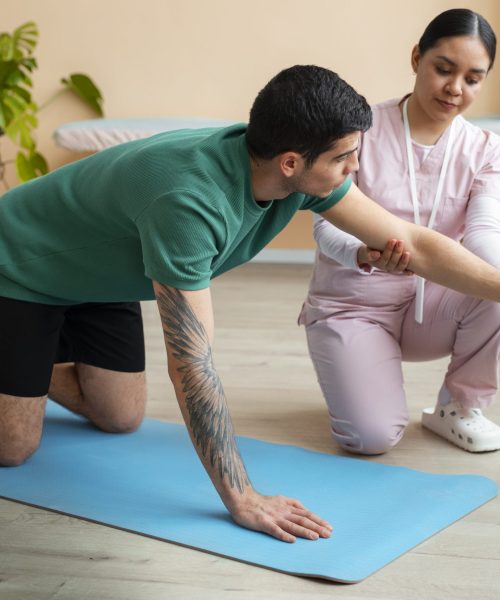 doctor-helping-patient-rehabilitation (1) doctor-helping-patient-rehabilitation (1)